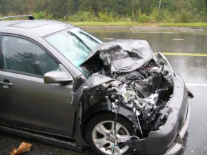 A silver car crashed in the front