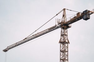 A yellow tower crane