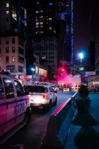 Two NYPD cars parked on the street