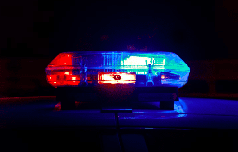 Flashing lights on top of a police car